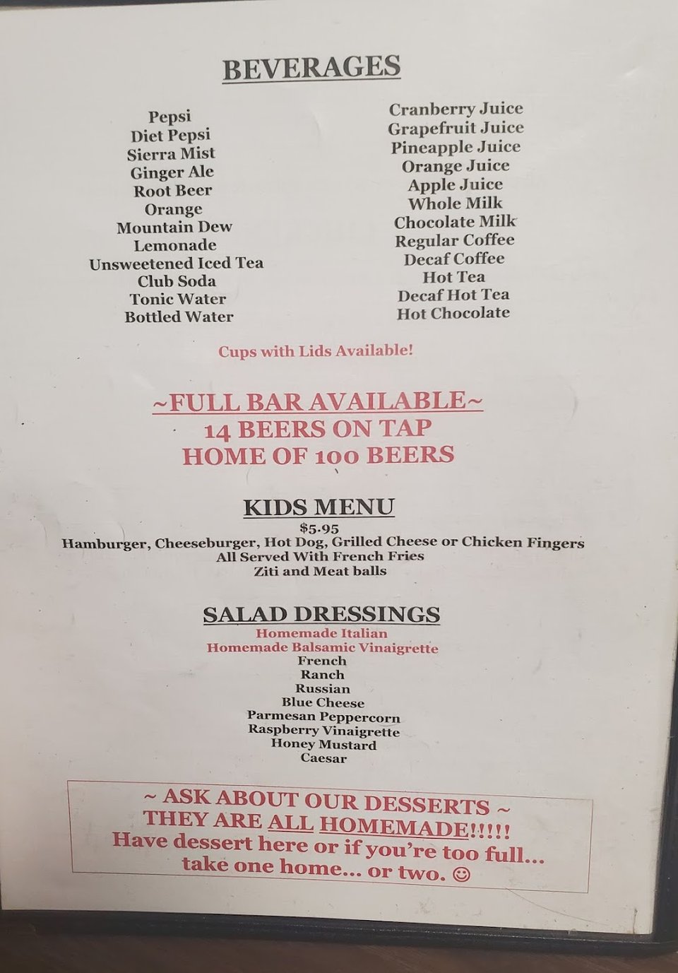 Printed menu showing subs, burgers, and sodas